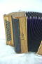 3 rangs 3 voix 12 basses noyer grille noire 07